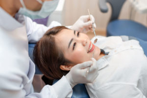 A young lady at the dentist.